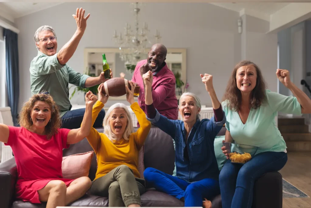 Seniors watching a football game